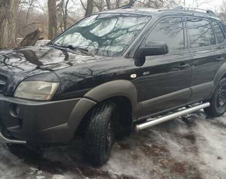 Черный Хендай Туксон, объемом двигателя 1.99 л и пробегом 211 тыс. км за 7999 $, фото 1 на Automoto.ua