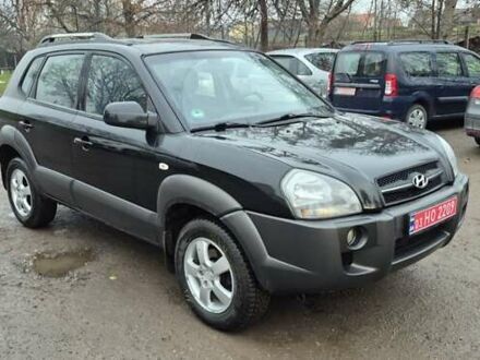 Чорний Хендай Туксон, об'ємом двигуна 1.98 л та пробігом 230 тис. км за 6390 $, фото 1 на Automoto.ua