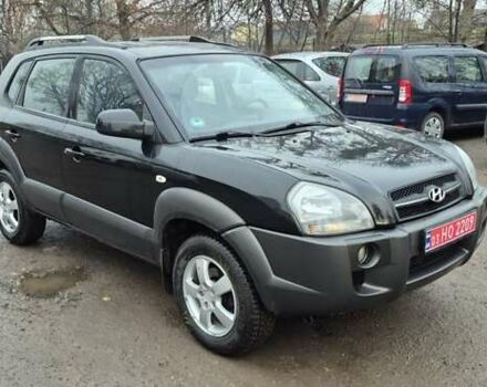 Чорний Хендай Туксон, об'ємом двигуна 1.98 л та пробігом 230 тис. км за 6390 $, фото 1 на Automoto.ua