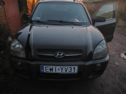 Черный Хендай Туксон, объемом двигателя 2 л и пробегом 370 тыс. км за 3300 $, фото 1 на Automoto.ua