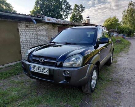 Черный Хендай Туксон, объемом двигателя 2 л и пробегом 238 тыс. км за 8200 $, фото 1 на Automoto.ua