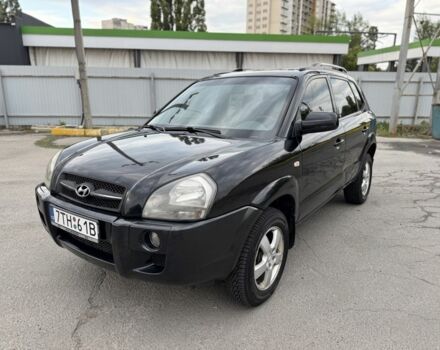 Черный Хендай Туксон, объемом двигателя 2 л и пробегом 235 тыс. км за 4300 $, фото 1 на Automoto.ua