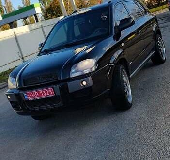 Черный Хендай Туксон, объемом двигателя 1.98 л и пробегом 173 тыс. км за 8000 $, фото 1 на Automoto.ua