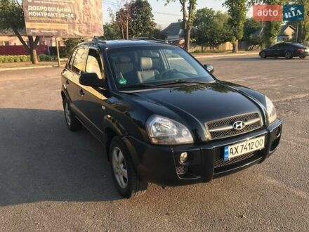 Черный Хендай Туксон, объемом двигателя 2 л и пробегом 253 тыс. км за 7500 $, фото 1 на Automoto.ua