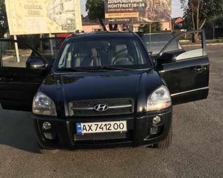 Чорний Хендай Туксон, об'ємом двигуна 1.98 л та пробігом 252 тис. км за 8150 $, фото 1 на Automoto.ua