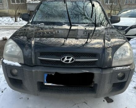 Черный Хендай Туксон, объемом двигателя 2 л и пробегом 345 тыс. км за 4200 $, фото 1 на Automoto.ua