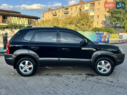 Черный Хендай Туксон, объемом двигателя 1.98 л и пробегом 217 тыс. км за 8300 $, фото 1 на Automoto.ua