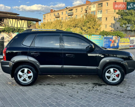 Черный Хендай Туксон, объемом двигателя 1.98 л и пробегом 217 тыс. км за 8300 $, фото 1 на Automoto.ua