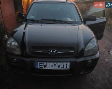Черный Хендай Туксон, объемом двигателя 1.99 л и пробегом 370 тыс. км за 3300 $, фото 1 на Automoto.ua