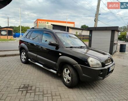 Черный Хендай Туксон, объемом двигателя 1.99 л и пробегом 250 тыс. км за 6650 $, фото 1 на Automoto.ua