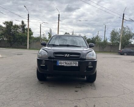 Черный Хендай Туксон, объемом двигателя 2 л и пробегом 208 тыс. км за 8600 $, фото 1 на Automoto.ua