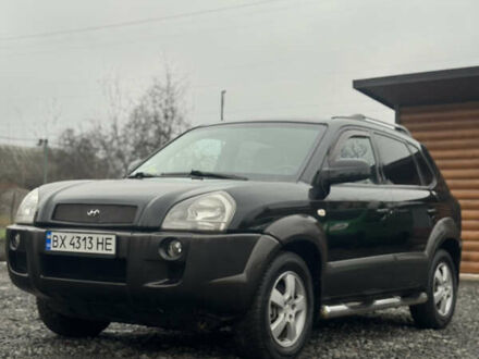 Черный Хендай Туксон, объемом двигателя 2 л и пробегом 257 тыс. км за 6800 $, фото 1 на Automoto.ua