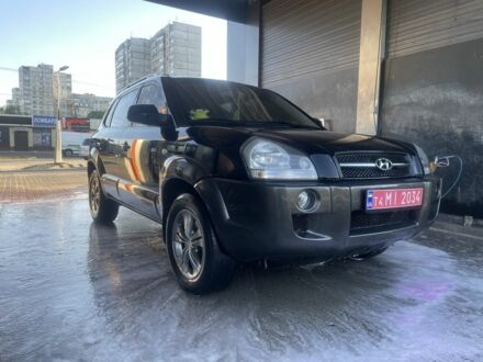 Чорний Хендай Туксон, об'ємом двигуна 2 л та пробігом 240 тис. км за 5400 $, фото 1 на Automoto.ua