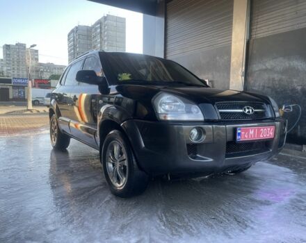 Черный Хендай Туксон, объемом двигателя 2 л и пробегом 240 тыс. км за 5400 $, фото 1 на Automoto.ua