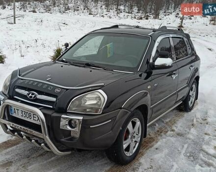 Черный Хендай Туксон, объемом двигателя 1.99 л и пробегом 230 тыс. км за 7200 $, фото 1 на Automoto.ua