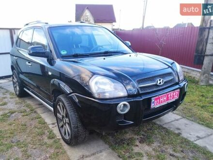 Черный Хендай Туксон, объемом двигателя 2 л и пробегом 208 тыс. км за 6900 $, фото 1 на Automoto.ua