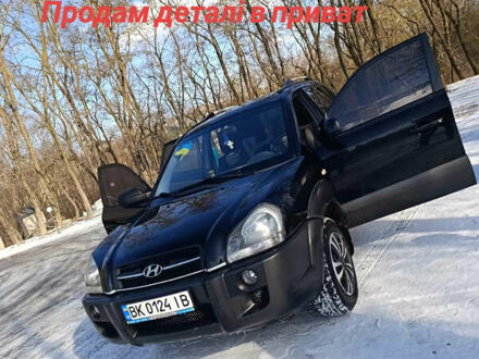 Черный Хендай Туксон, объемом двигателя 1.98 л и пробегом 27 тыс. км за 6000 $, фото 1 на Automoto.ua