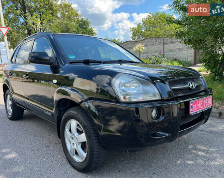 Чорний Хендай Туксон, об'ємом двигуна 2 л та пробігом 207 тис. км за 7300 $, фото 1 на Automoto.ua
