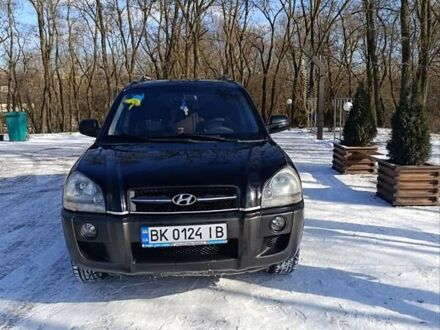 Чорний Хендай Туксон, об'ємом двигуна 1.98 л та пробігом 285 тис. км за 5600 $, фото 1 на Automoto.ua