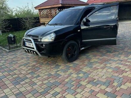 Черный Хендай Туксон, объемом двигателя 2 л и пробегом 315 тыс. км за 7000 $, фото 1 на Automoto.ua