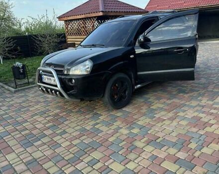 Черный Хендай Туксон, объемом двигателя 2 л и пробегом 315 тыс. км за 7000 $, фото 1 на Automoto.ua