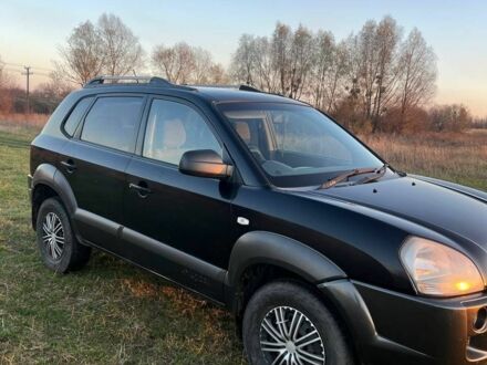 Черный Хендай Туксон, объемом двигателя 2 л и пробегом 137 тыс. км за 4300 $, фото 1 на Automoto.ua