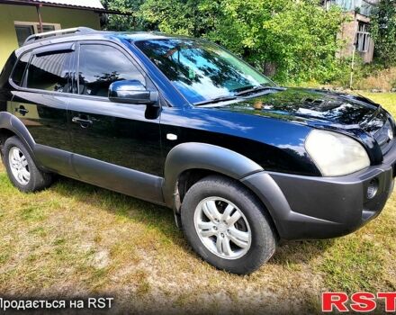 Чорний Хендай Туксон, об'ємом двигуна 2 л та пробігом 289 тис. км за 7400 $, фото 1 на Automoto.ua