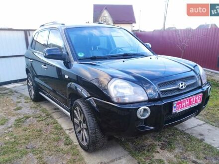 Черный Хендай Туксон, объемом двигателя 2 л и пробегом 208 тыс. км за 6950 $, фото 1 на Automoto.ua