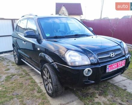 Черный Хендай Туксон, объемом двигателя 2 л и пробегом 208 тыс. км за 6950 $, фото 1 на Automoto.ua