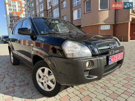 Чорний Хендай Туксон, об'ємом двигуна 2 л та пробігом 196 тис. км за 7300 $, фото 1 на Automoto.ua