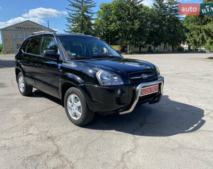 Черный Хендай Туксон, объемом двигателя 2 л и пробегом 221 тыс. км за 7895 $, фото 1 на Automoto.ua
