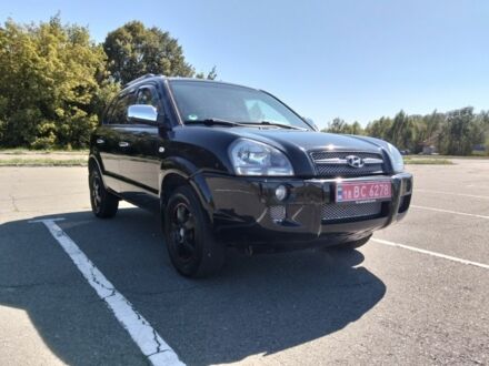 Чорний Хендай Туксон, об'ємом двигуна 2 л та пробігом 184 тис. км за 7690 $, фото 1 на Automoto.ua
