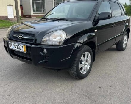 Черный Хендай Туксон, объемом двигателя 2 л и пробегом 175 тыс. км за 7400 $, фото 1 на Automoto.ua