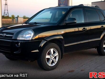 Чорний Хендай Туксон, об'ємом двигуна 2 л та пробігом 138 тис. км за 7800 $, фото 1 на Automoto.ua