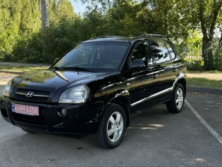 Черный Хендай Туксон, объемом двигателя 2 л и пробегом 266 тыс. км за 7700 $, фото 1 на Automoto.ua