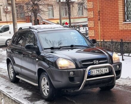 Черный Хендай Туксон, объемом двигателя 2 л и пробегом 211 тыс. км за 7250 $, фото 1 на Automoto.ua