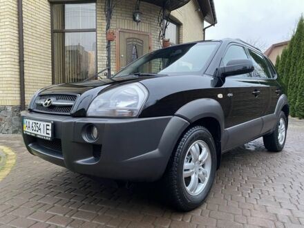 Черный Хендай Туксон, объемом двигателя 2 л и пробегом 186 тыс. км за 9400 $, фото 1 на Automoto.ua