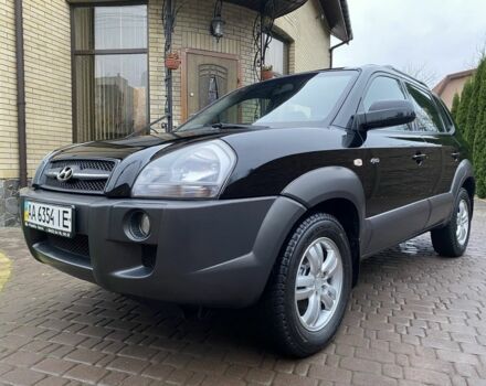 Черный Хендай Туксон, объемом двигателя 2 л и пробегом 186 тыс. км за 9400 $, фото 1 на Automoto.ua