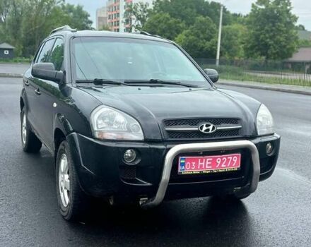 Черный Хендай Туксон, объемом двигателя 1.98 л и пробегом 230 тыс. км за 7800 $, фото 1 на Automoto.ua