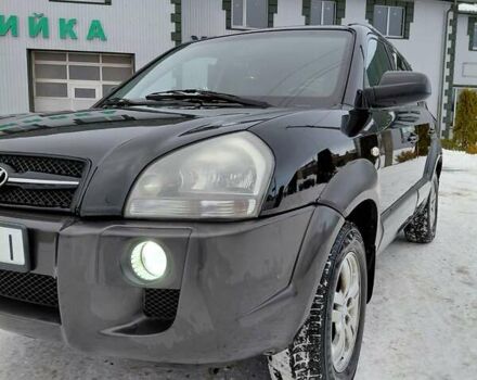 Черный Хендай Туксон, объемом двигателя 1.98 л и пробегом 258 тыс. км за 7800 $, фото 1 на Automoto.ua