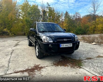 Черный Хендай Туксон, объемом двигателя 2 л и пробегом 250 тыс. км за 7500 $, фото 1 на Automoto.ua