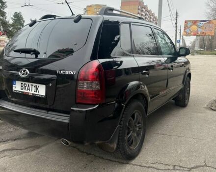 Чорний Хендай Туксон, об'ємом двигуна 2 л та пробігом 176 тис. км за 7600 $, фото 1 на Automoto.ua