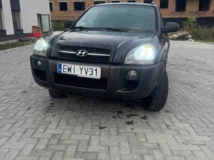 Черный Хендай Туксон, объемом двигателя 2 л и пробегом 369 тыс. км за 4300 $, фото 1 на Automoto.ua