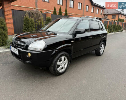 Черный Хендай Туксон, объемом двигателя 2 л и пробегом 237 тыс. км за 7400 $, фото 1 на Automoto.ua