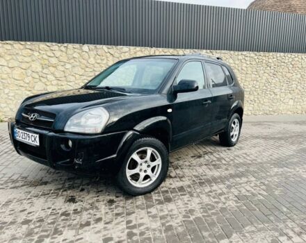 Черный Хендай Туксон, объемом двигателя 2 л и пробегом 310 тыс. км за 6600 $, фото 1 на Automoto.ua