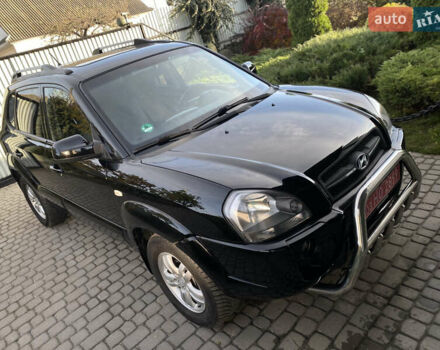 Чорний Хендай Туксон, об'ємом двигуна 1.98 л та пробігом 233 тис. км за 7650 $, фото 1 на Automoto.ua
