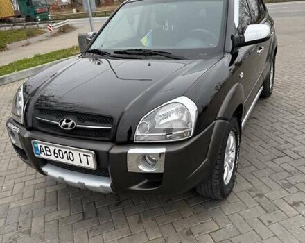 Черный Хендай Туксон, объемом двигателя 2 л и пробегом 124 тыс. км за 7950 $, фото 1 на Automoto.ua