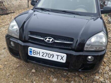 Черный Хендай Туксон, объемом двигателя 2 л и пробегом 230 тыс. км за 6800 $, фото 1 на Automoto.ua