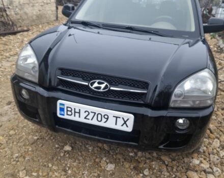 Черный Хендай Туксон, объемом двигателя 2 л и пробегом 230 тыс. км за 6800 $, фото 1 на Automoto.ua