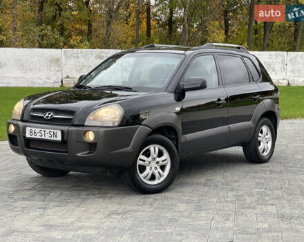 Черный Хендай Туксон, объемом двигателя 2 л и пробегом 216 тыс. км за 7500 $, фото 1 на Automoto.ua